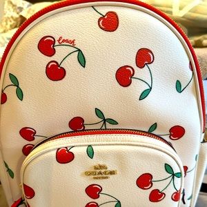 Coach Cherry backpack medium size, excellent condition, no scratches